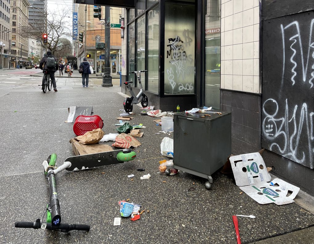 Trash and graffiti remain a problem in downtown Seattle and a focus of recovery efforts. (Steve Ringman / The Seattle Times)