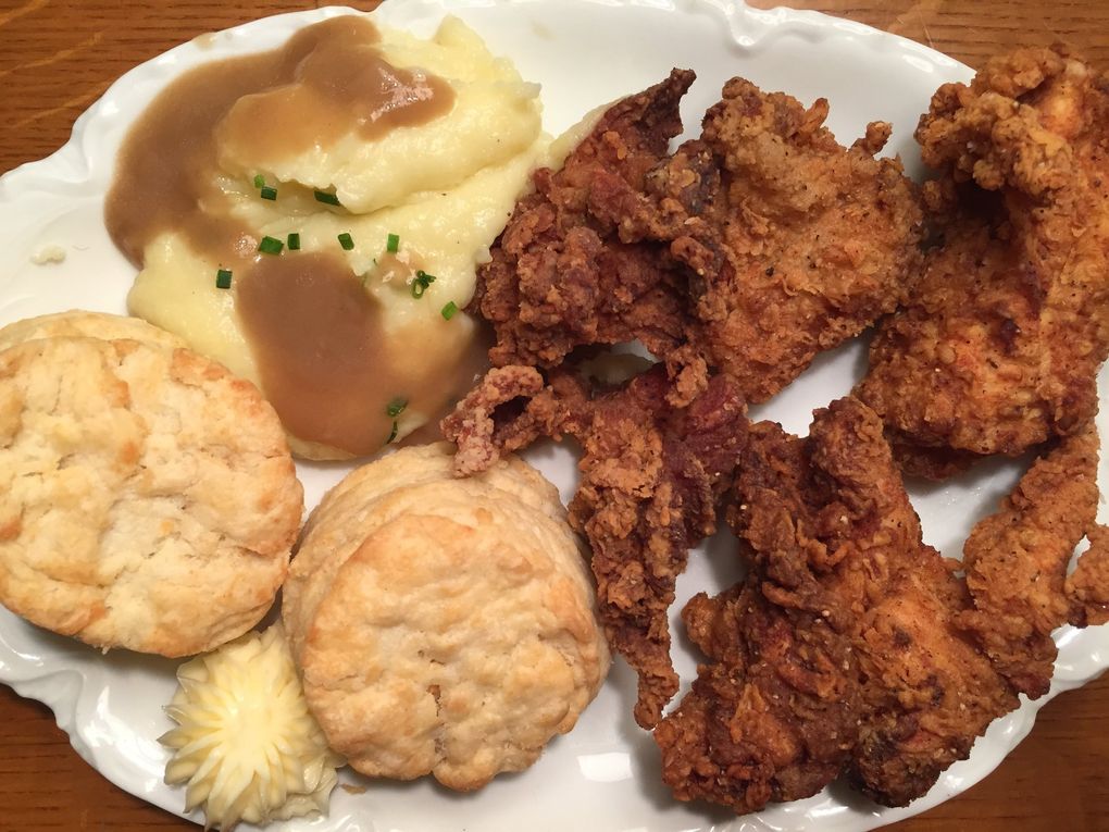 Frank’s Oyster House & Champagne Parlor in Ravenna makes some of Seattle’s best buttermilk-brined fried chicken, served with Robuchon-inspired potato puree, gravy, buttermilk biscuits and honey butter.  (Bethany Jean Clement / The Seattle Times)