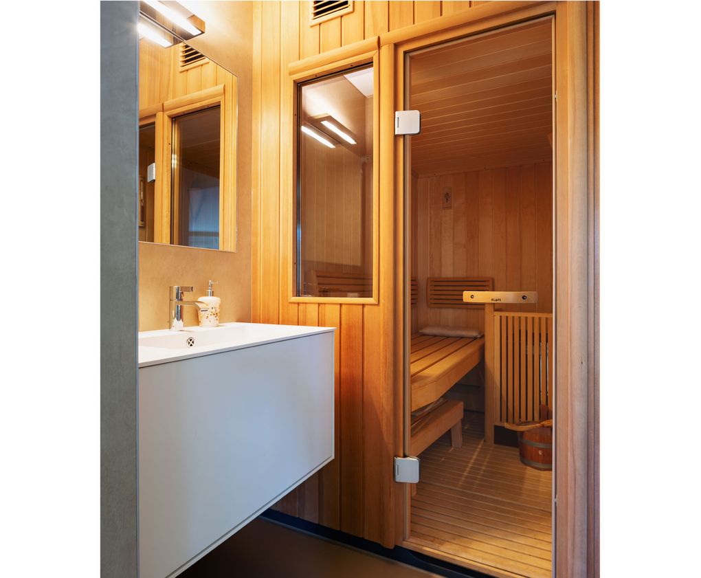 If you have the space and budget, adding a small sauna or steam room can make your bath feel like a spa. (Getty Images)