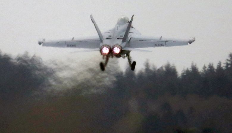 An EA-18G Growler takes off from Naval Air Station Whidbey Island in 2016. The nonprofit Citizens of Ebey’s Reserve is threatening to sue if federal agencies don’t reconsider how Growler flights may impact endangered southern resident orcas and threatened marbled murrelets. (Ken Lambert / The Seattle Times, file)
