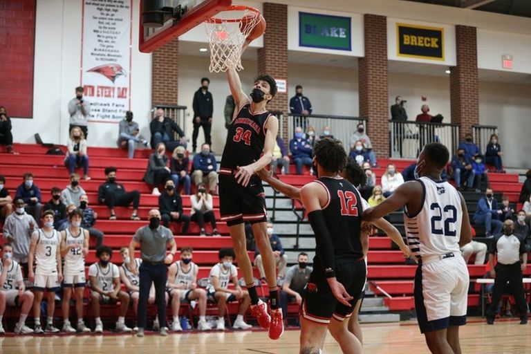 Chet Holmgren, dunking against Totino-Grace in the Class 3A, section 4 championship on Friday, was named the Wootten National Player of the Year in boys’ basketball