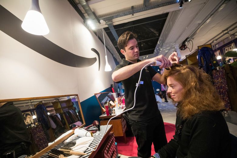 Amazon said its new hair salon in London will open to the public in the “coming weeks.” Over the past few years, Amazon has pushed into brick-and-mortar retail, including building pop-up stores. Above, an employee from Nicky Clarke hair salon curls a customer’s hair at Amazon’s Black Friday pop-up store in London, in 2018. (Chris Ratcliffe / Bloomberg)