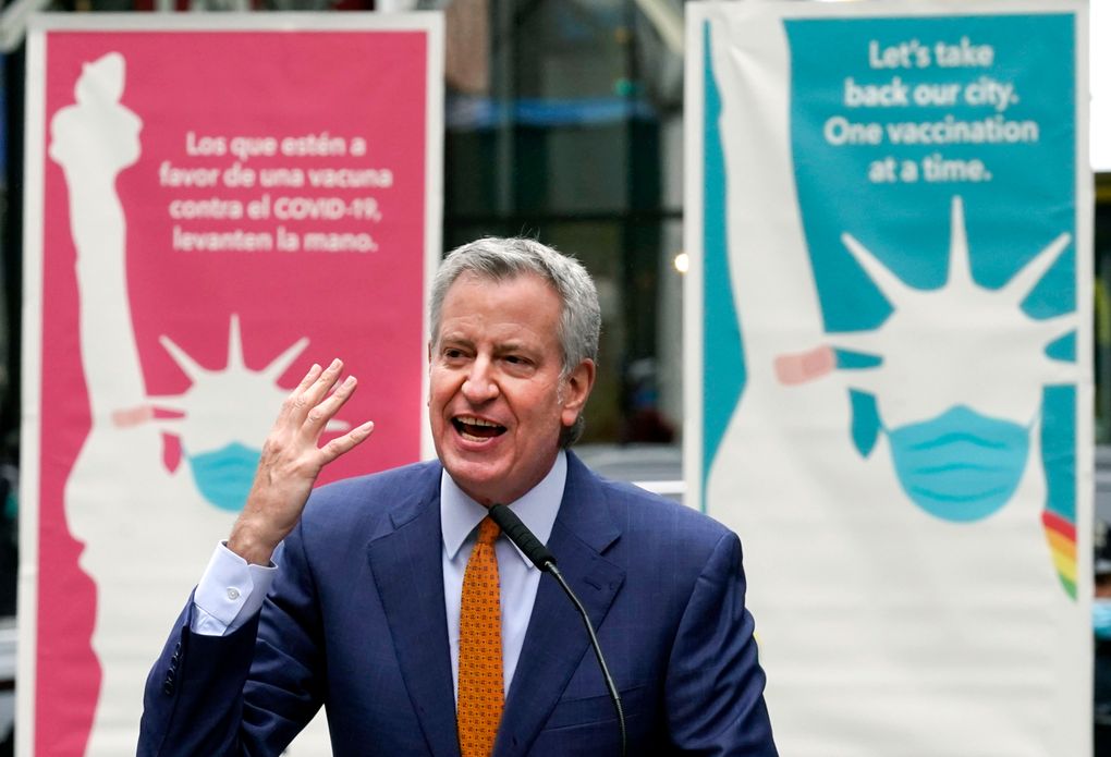 New York Mayor Bill de Blasio delivers remarks in Times Square after he toured the grand opening of a Broadway COVID-19 vaccination site intended to jump-start the city’s entertainment industry, in New York. Blasio expects the city to “fully reopen” by July 1, with the lifting of the city’s COVID-19 restrictions. (AP Photo/Richard Drew, file)