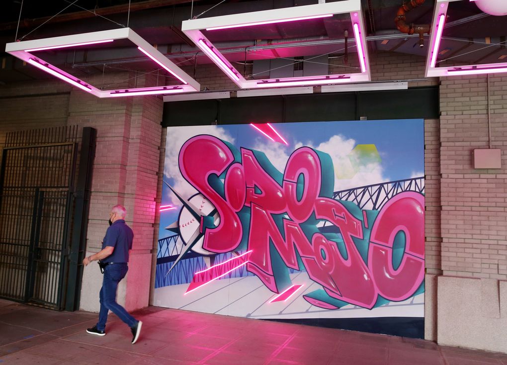 The ‘Pen area has gotten a makeover, including new graphics along the entryway. The T-Mobile ‘Pen features murals by Seattle artist Jeff “Weirdo” Jacobson. (Ken Lambert / The Seattle Times)