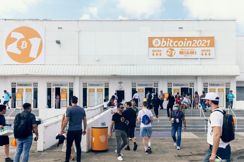 People mill about outside the Bitcoin 2021 confab in Miami on June 4. The FBI’s recovery of bitcoins paid in the Colonial Pipeline ransomware attack showed cryptocurrencies are not as hard to track as it might seem. (Alfonso Duran / The New York Times)