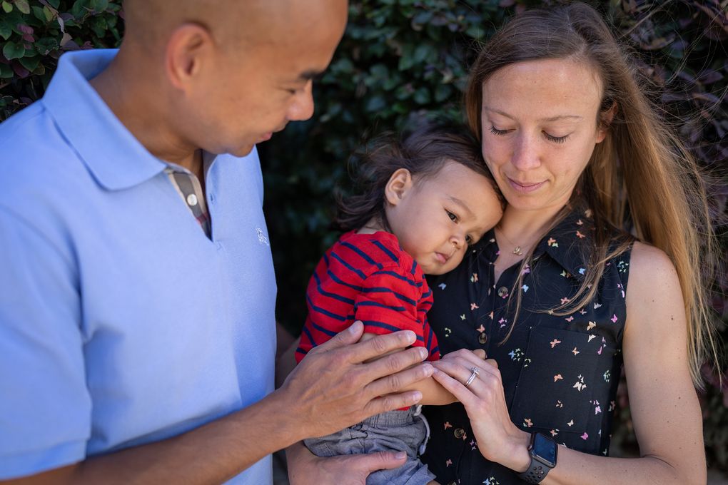 Rob and Gina Domaoal this week in Decatur, Ga., with their 20-month-old son, Eli, who picked up a virus in day care. (Photo for The Washington Post by Michael A. Schwarz).