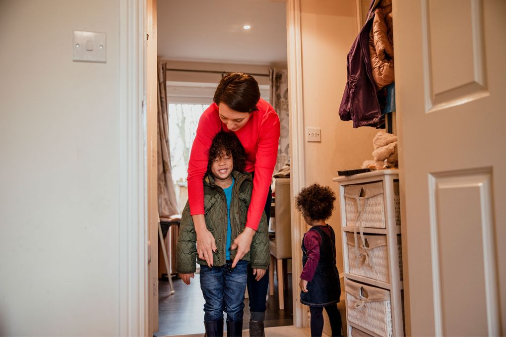 An organized entry or mudroom will help corral coats, shoes and backpacks. Even a few hooks and a simple shoe shelf can contain clutter. (Getty Images)