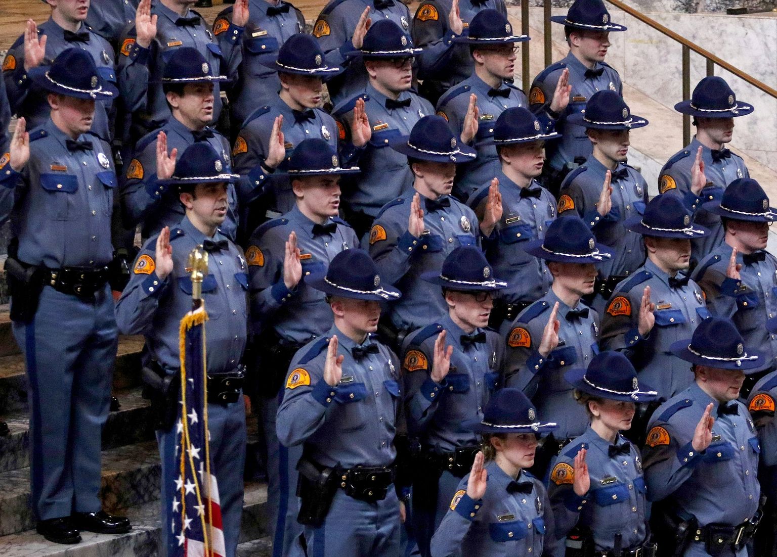 Thirty-one new Washington state troopers are sworn in.