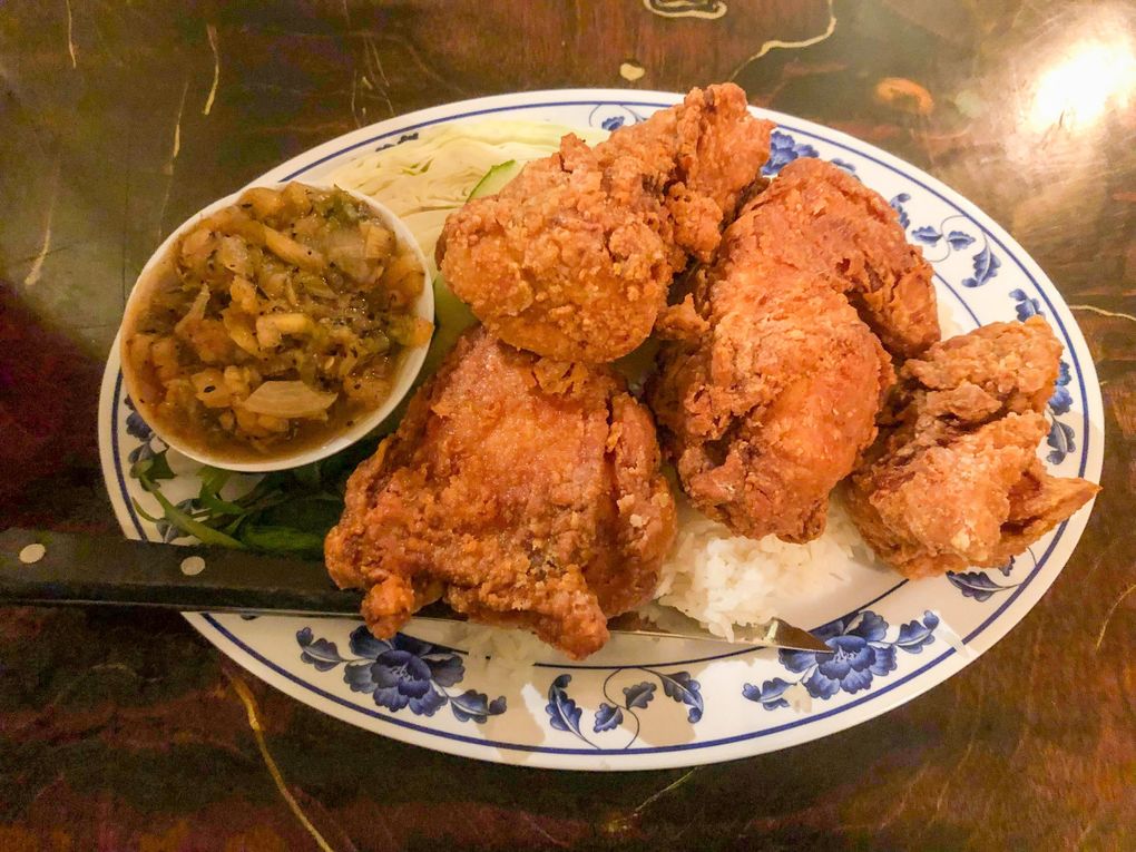 The fried chicken at Kedai Makan is juicy and richly flavored with shrimp paste, turmeric and coriander. (Jade Yamazaki Stewart / The Seattle Times)