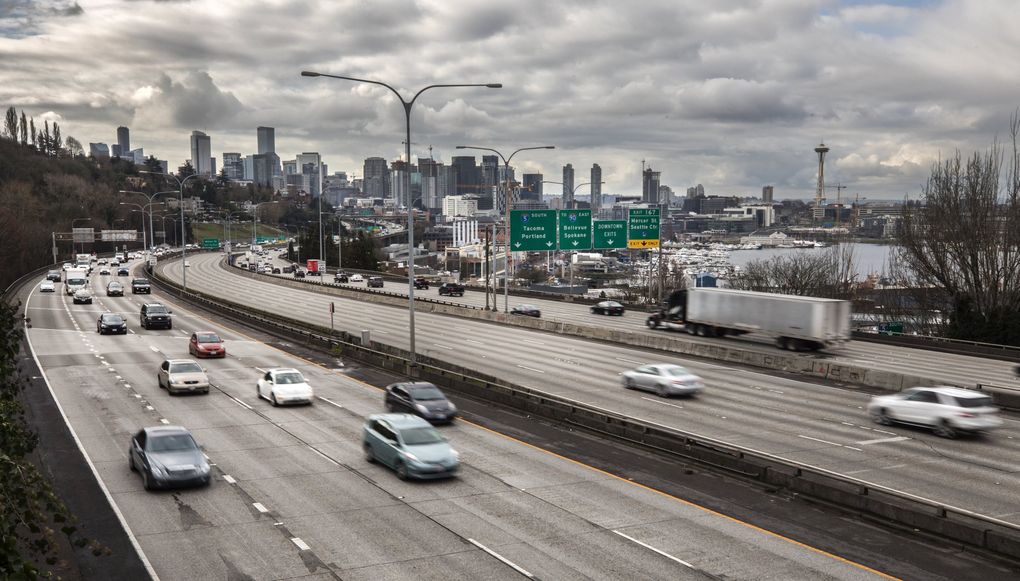 Very light traffic on Interstate 5 running through Seattle at about 10 a.m. on March 12, 2020. (Steve Ringman / The Seattle Times)