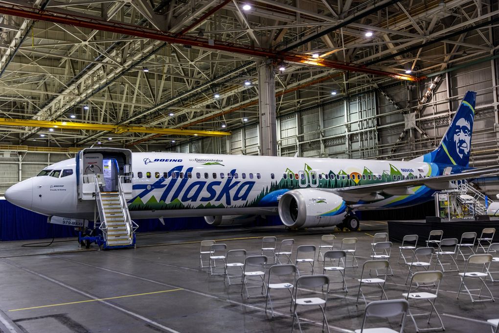 Boeing’s 737 MAX ecoDemonstrator, borrowed from Alaska Airlines, is parked in a hangar at Boeing Field last month. The plane is outfitted with specialized equipment to test a variety of small-scale sustainable technologies that may increase fuel efficiency and reduce emissions. (Daniel Kim / The Seattle Times)