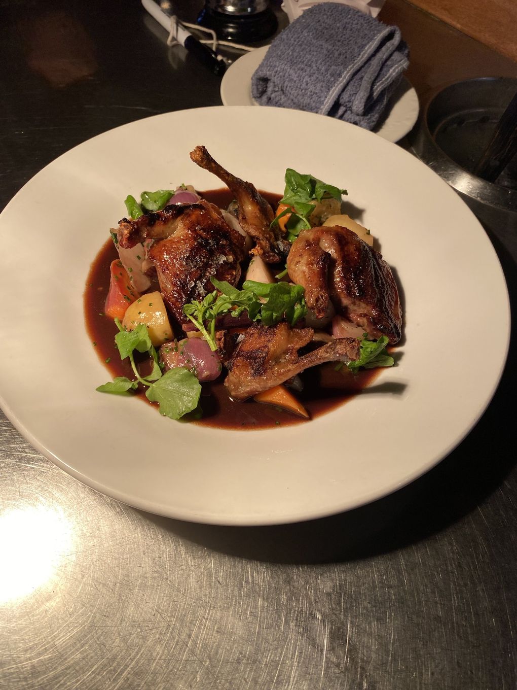 Squab au Vin, L’Oursin: This tasty bird has a little barbecue flavor after being finished over a yakitori grill. It tastes like a smoked Peruvian guinea pig. (Courtesy L’Oursin)