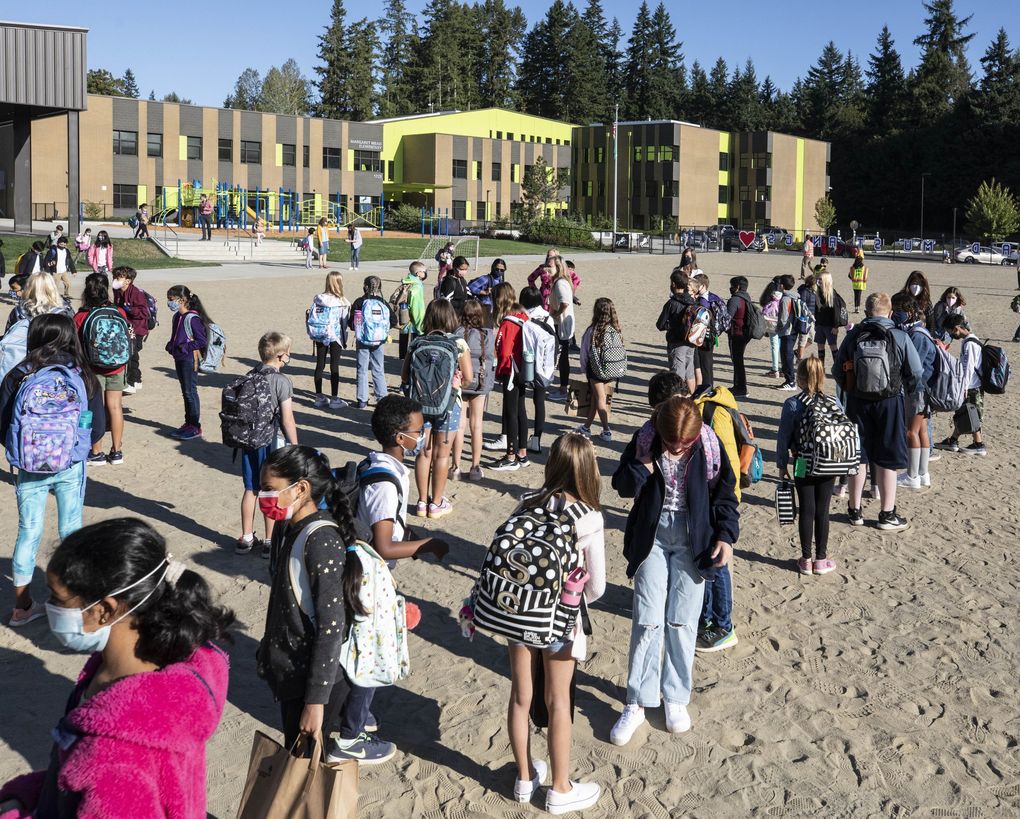 Kids line up on the first day of school Sept. 1 outside Margaret Mead Elementary in Sammamish.
