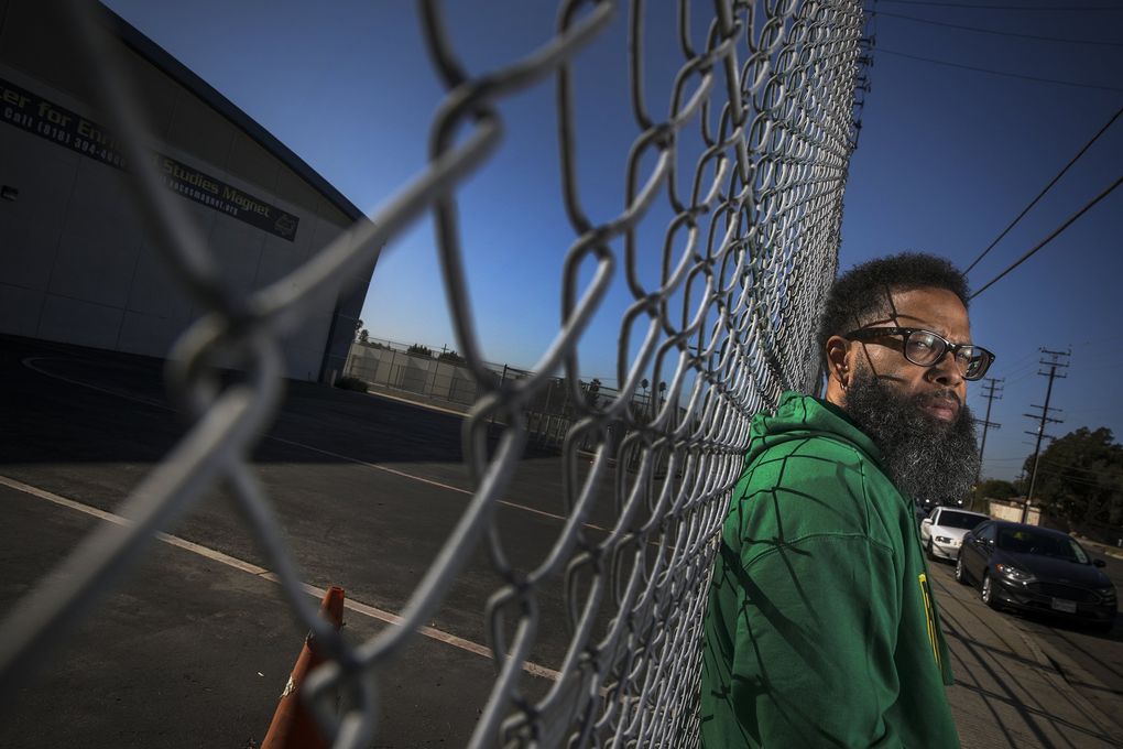 Former film-production teacher Jamal Y. Speakes Sr. can no longer get past the perimeter fence of Valley Oaks Center for Enriched Studies in Sun Valley, California, because he refused a COVID-19 vaccination. He applied for a religious exemption and got one, but could no longer teach in person. (Irfan Khan/Los Angeles Times/TNS) 