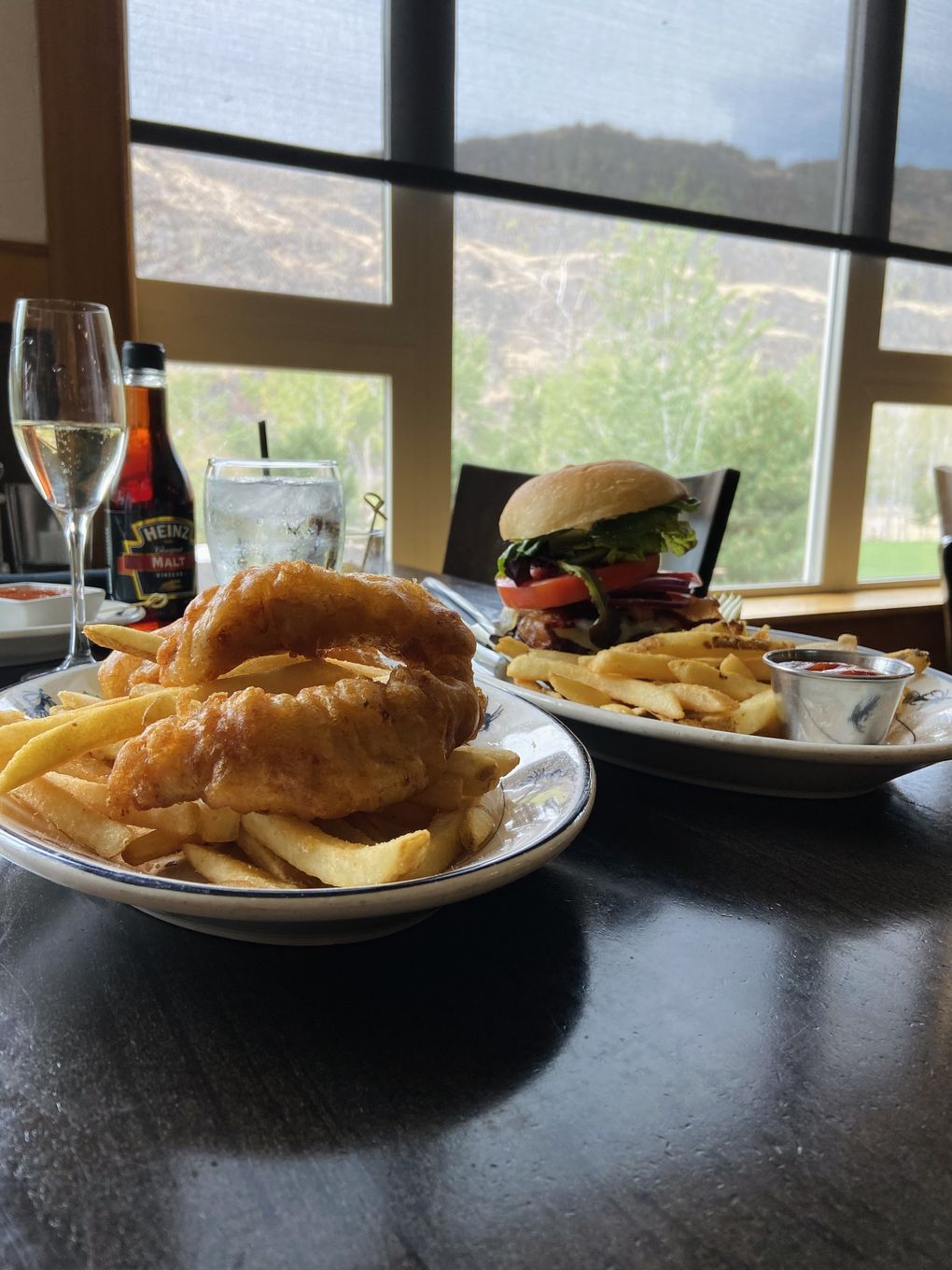 The crispy Alaskan ling cod fish and chips and the grilled S.F.R. American wagyu beef burger at the Canyon River Grill in Ellensburg, Washington, are winners. (Jazmin Tolliver / The Seattle Times)