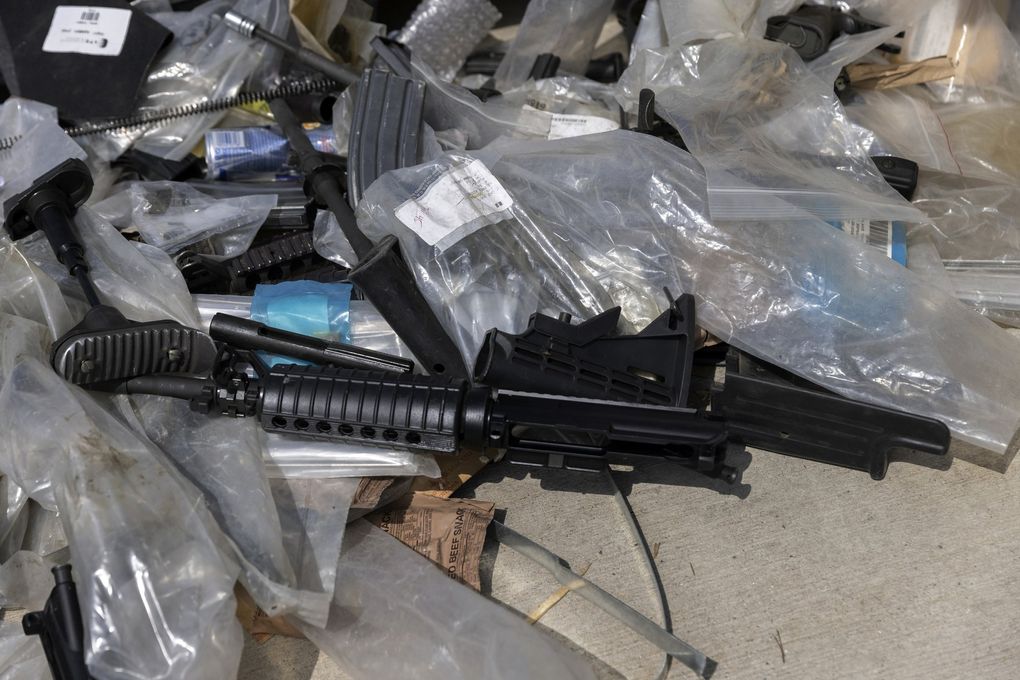American-made rifle parts left behind by departing U.S. forces at the international airport in Kabul are pictured on Aug. 31, 2021. (Victor J. Blue / The New York Times)