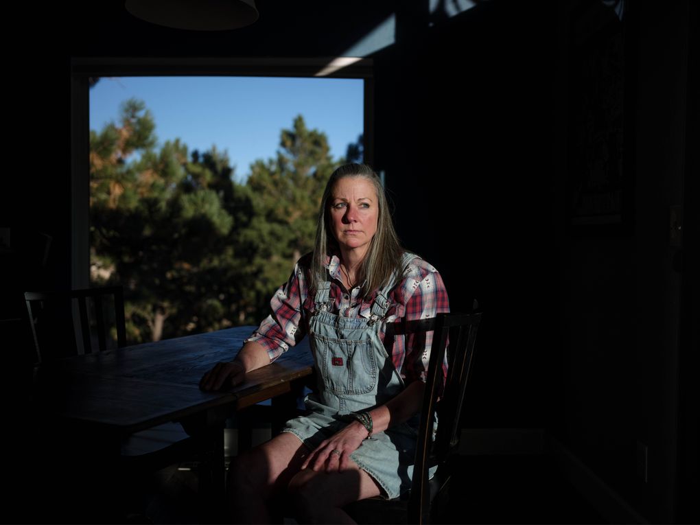 Michele Lawrence, shown in her Paradise Hills home, said the idea of 24-hour surveillance of vehicles’ comings and goings creeped her out. “You would think we were living in a war zone,” she said. (Photo by Stephen Speranza for The Washington Post)