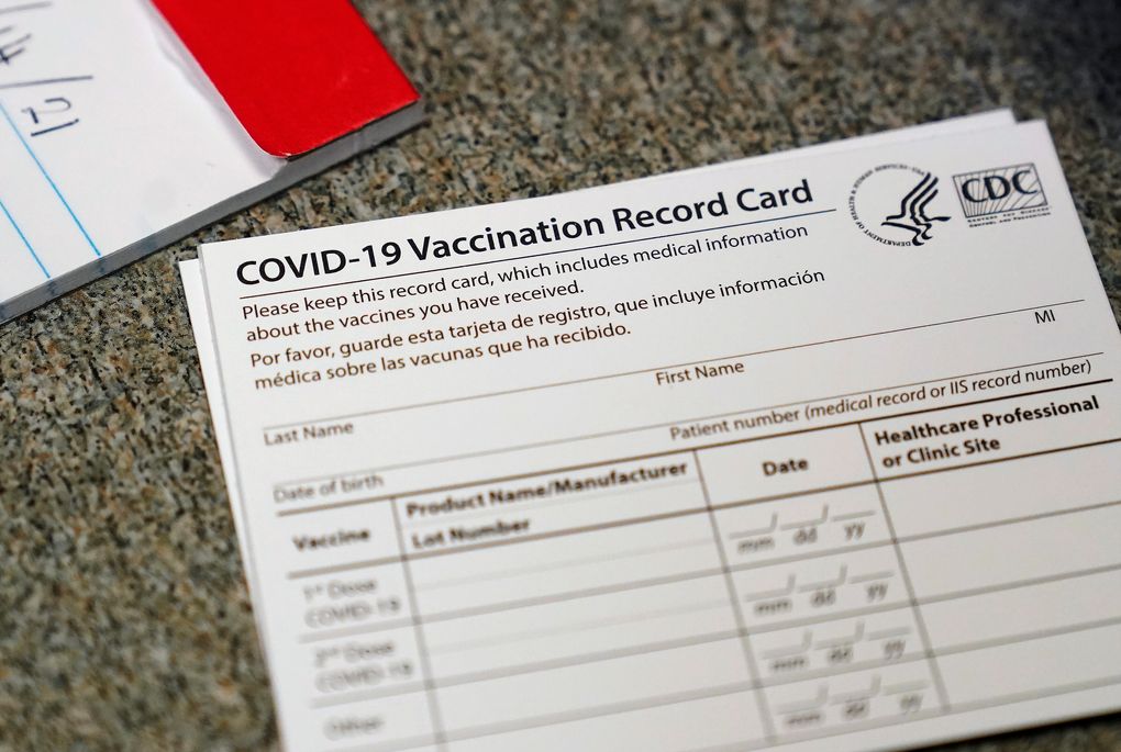 FILE – In this Dec. 24, 2020, file photo, a COVID-19 vaccination record card is shown at Seton Medical Center in Daly City, Calif. Los Angeles leaders are poised to enact one of the nation’s strictest vaccine mandates, a sweeping measure that would require the shots for everyone entering a bar, restaurant, nail salon, gym or even a Lakers game. The City Council on Wednesday, Oct. 6, 2021, is scheduled to consider the proposal and most members have said they support it as a way of preventing further COVID-019 surges. (AP Photo/Jeff Chiu, File)