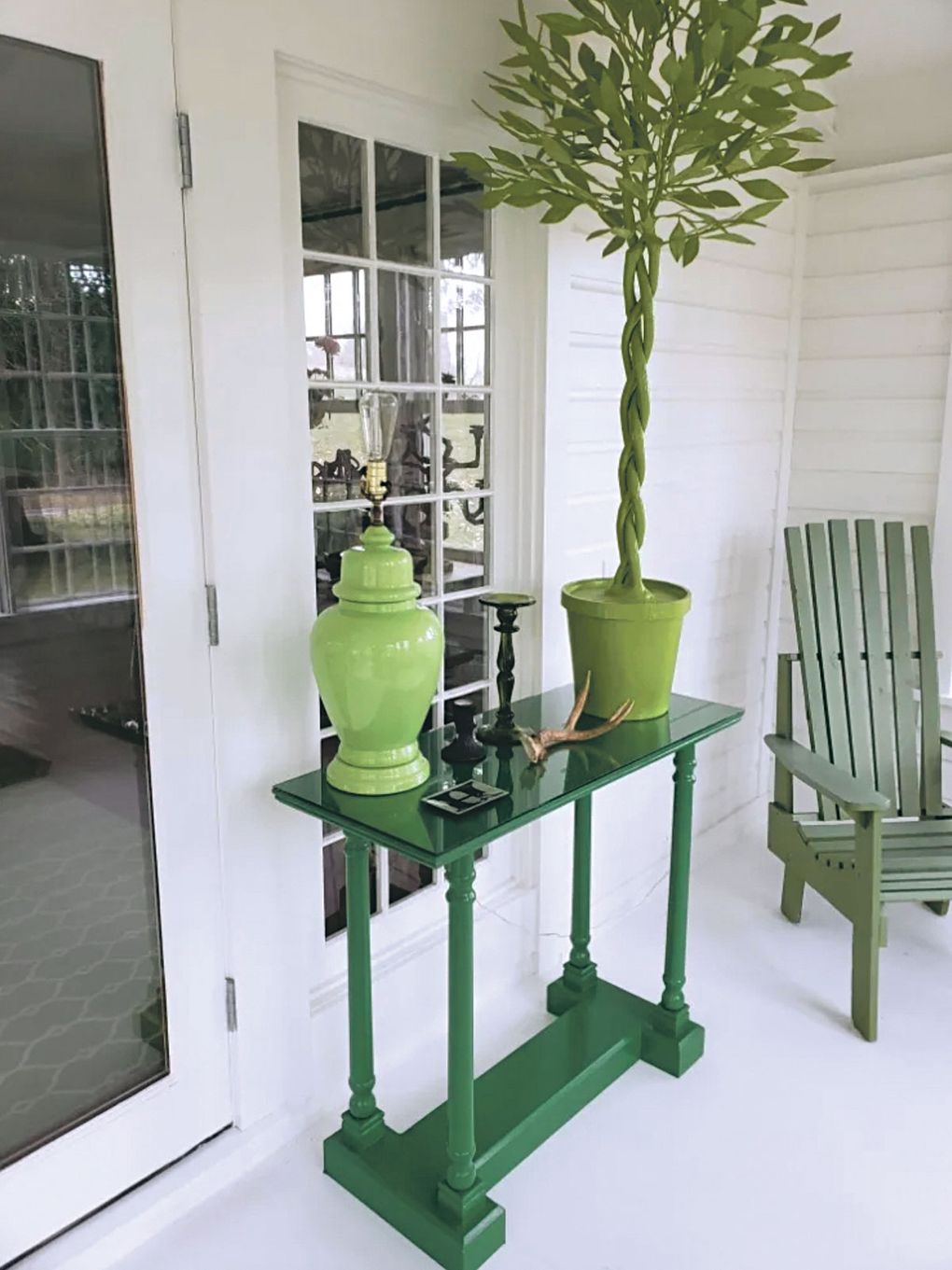 Outdoor decorations can create a welcoming vibe for holiday guests. Ted Kennedy Watson says his enclosed front porch has become one of his favorite areas to decorate. (Courtesy of Watson Kennedy Fine Home)