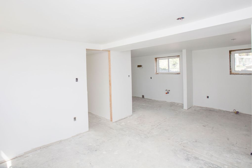 Finishing or partially finishing a basement may be possible within a $20,000 budget, depending on the scope of the project and condition of the basement. (Getty Images)